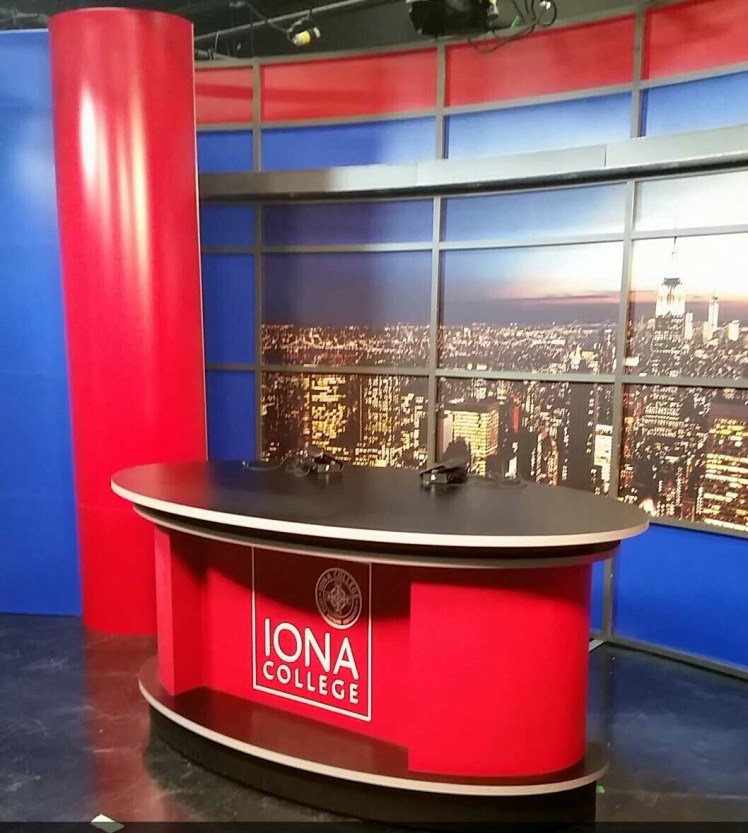In the fall of 2015, the Iona College Mass Communications Dept. purchased a new set for its studio in the Murphy Center. This allows students to get experience sitting at an actual news desk.